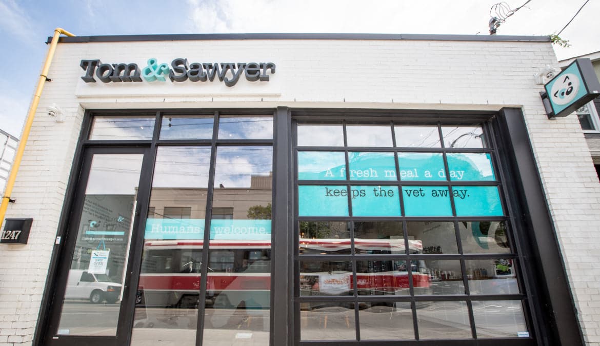 The Tom&Sawyer storefront and kitchen in Toronto